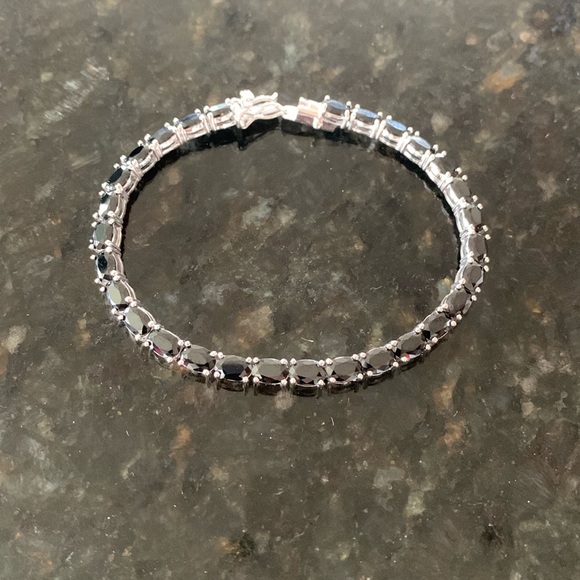 See Berkeley Jewelry Sterling and oval Black Onyx tennis bracelet 7”